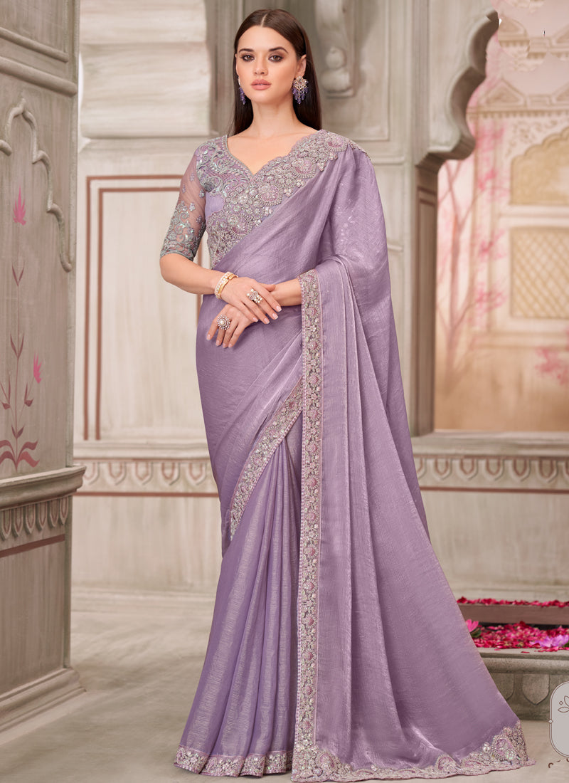 Beautiful lavender traditional wedding saree featuring delicate embroidery and an unstitched blouse