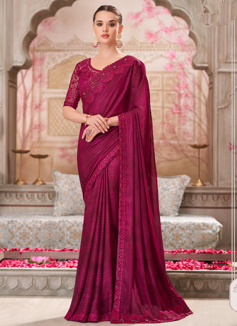 Elegant magenta pink traditional wedding saree with intricate embroidery