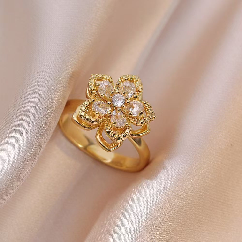 Nephthytis Zircon Flower Rotating Ring - Elegant Niche Jewelry