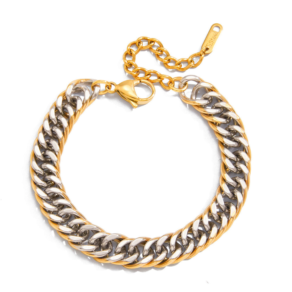 Polished two-tone stainless steel Cuban link bracelet showcased on a clean background.