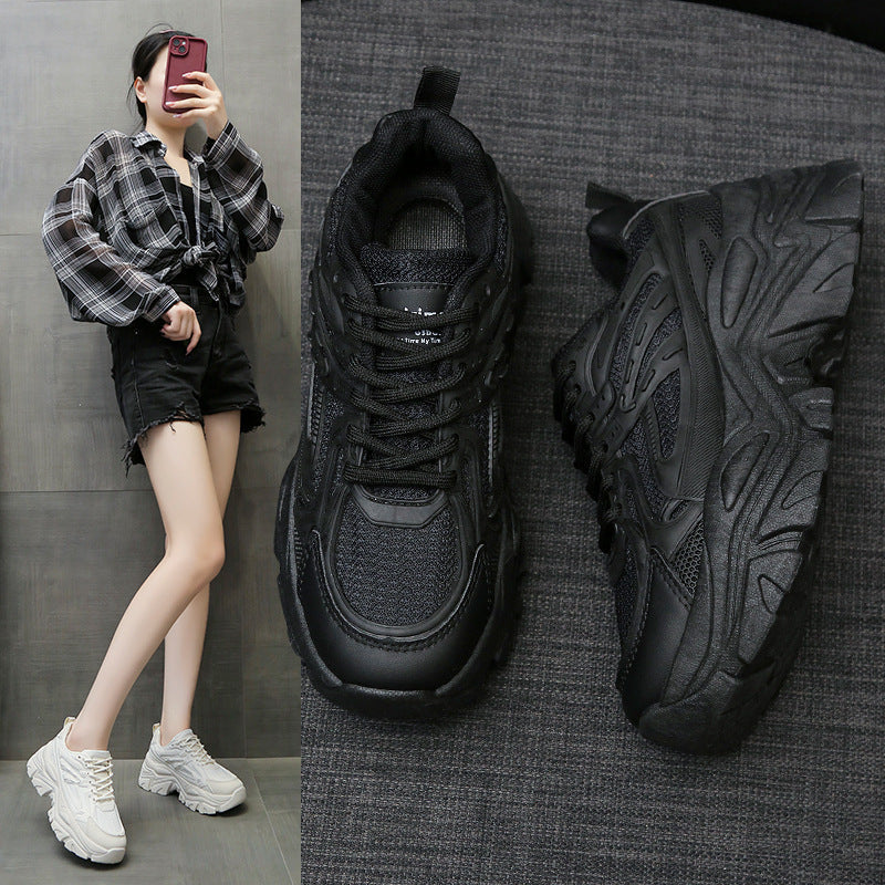 A pair of black chunky platform sneakers with breathable mesh upper, displayed from side and top angles, suitable for casual wear.