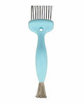 Light blue 2-in-1 hair brush cleaner tool on a clean, minimalist surface.