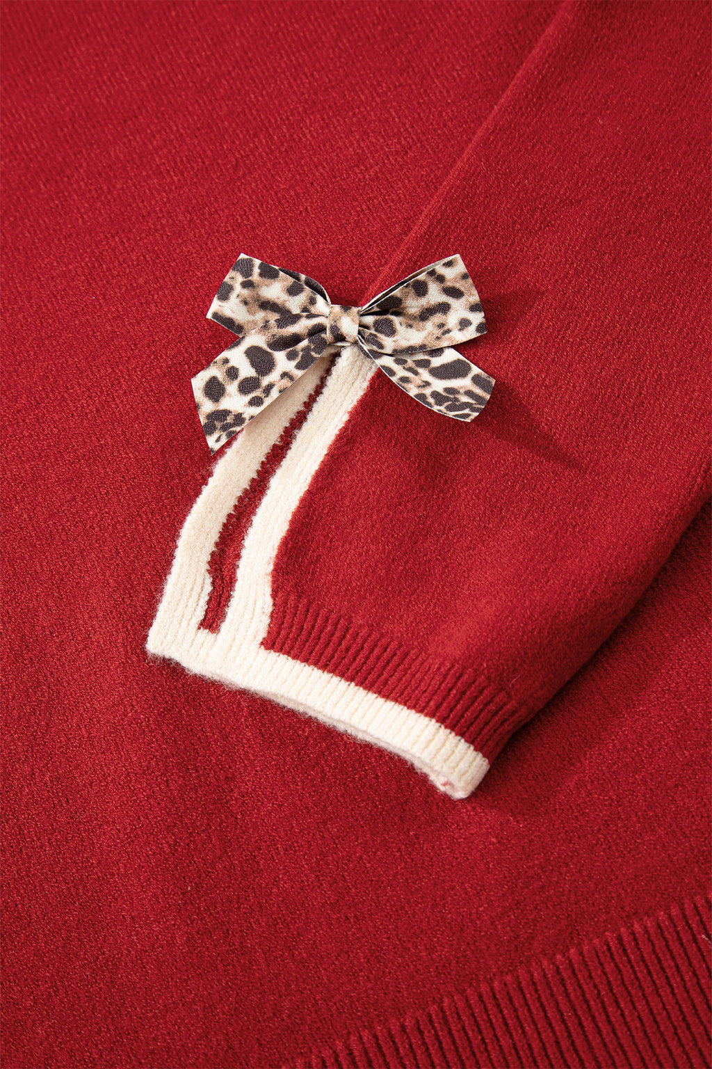 Leopard Bow Split Cuff Contrast Trim Sweater