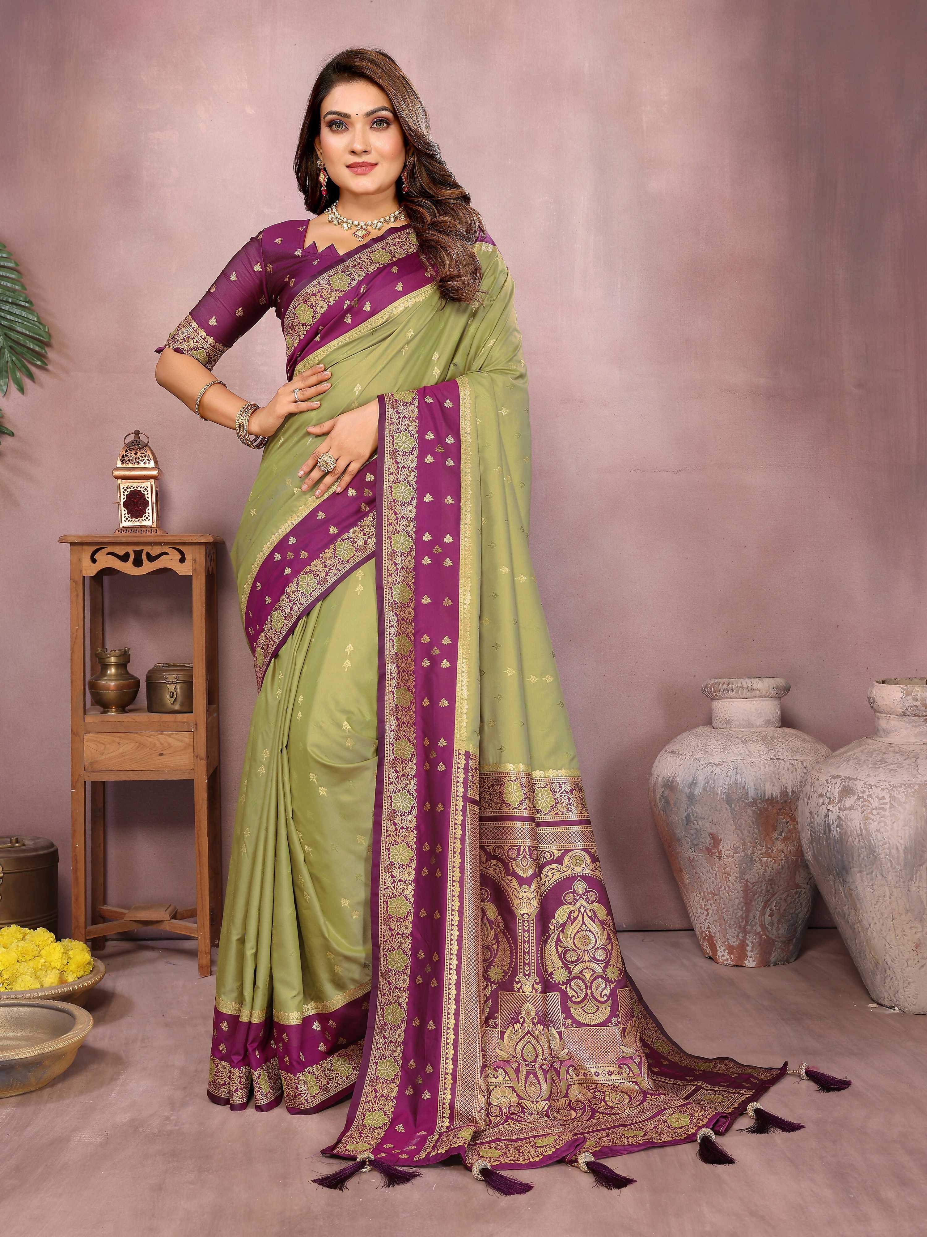 Mahendi colored Kalamkari silk saree with Zari woven border