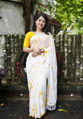 Yellow poly georgette tie and dye saree with satin pattu border