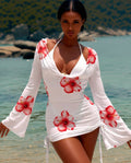 Women's 3-piece floral swimsuit set with wrap skirt in white and red.