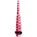 0 Gauge white acrylic ear taper featuring a red heart pattern with two black rubber O-rings