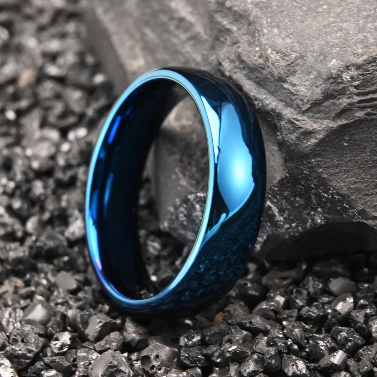 Blue-plated curved tungsten steel ring in various widths displayed on a clean background