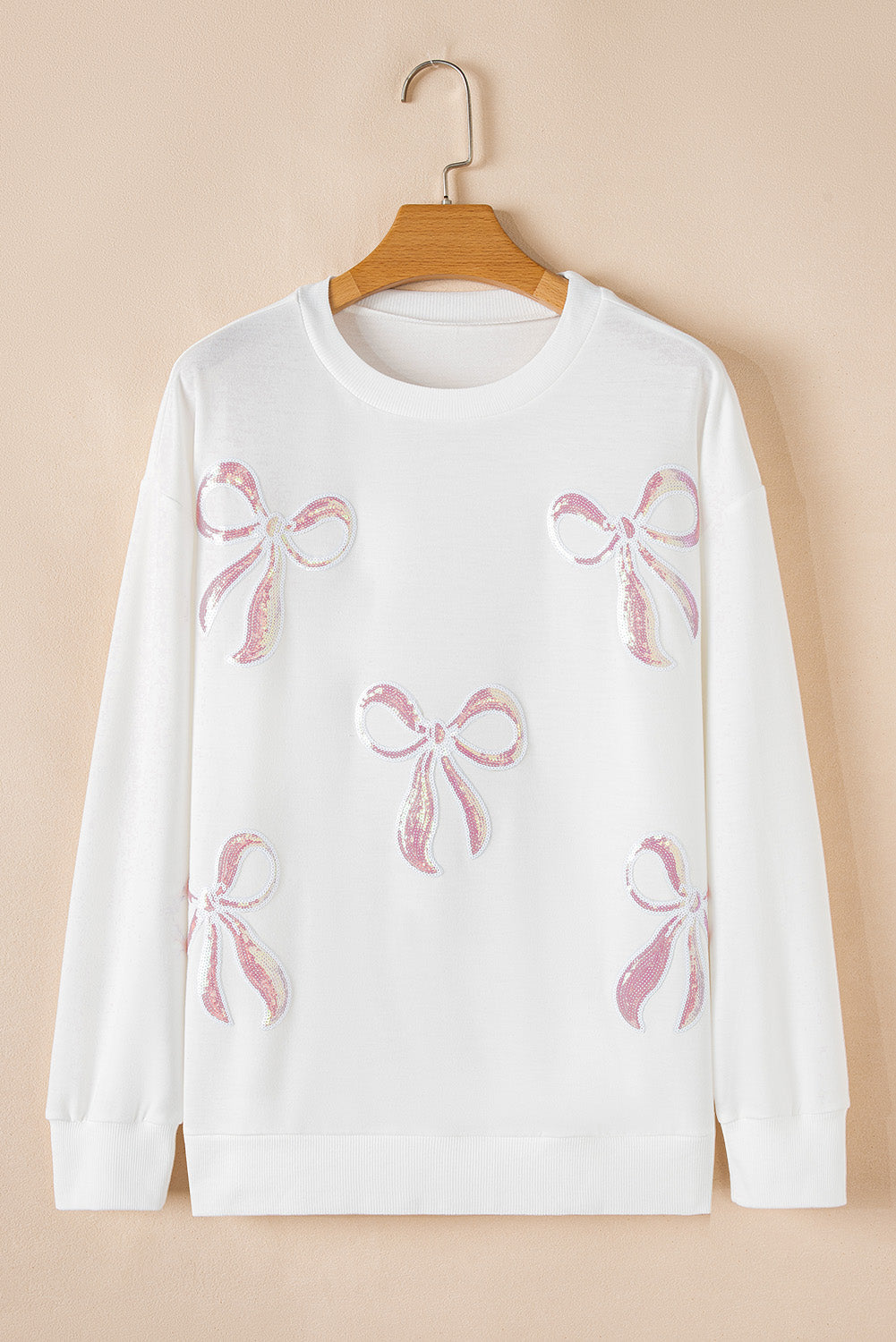 White Oversized Sweatshirt with Pink Sequin Bowknot Detail - Image 6