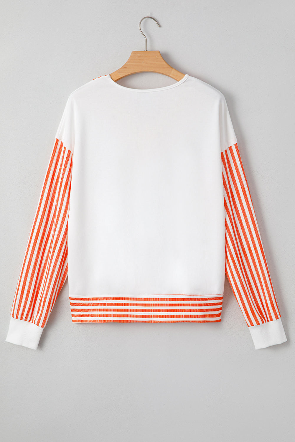 White Long Sleeve Top with Orange Striped Accents and V-Neck