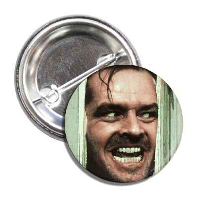 A 1-inch pop-culture button featuring Jack Nicholson on a multi-color background.