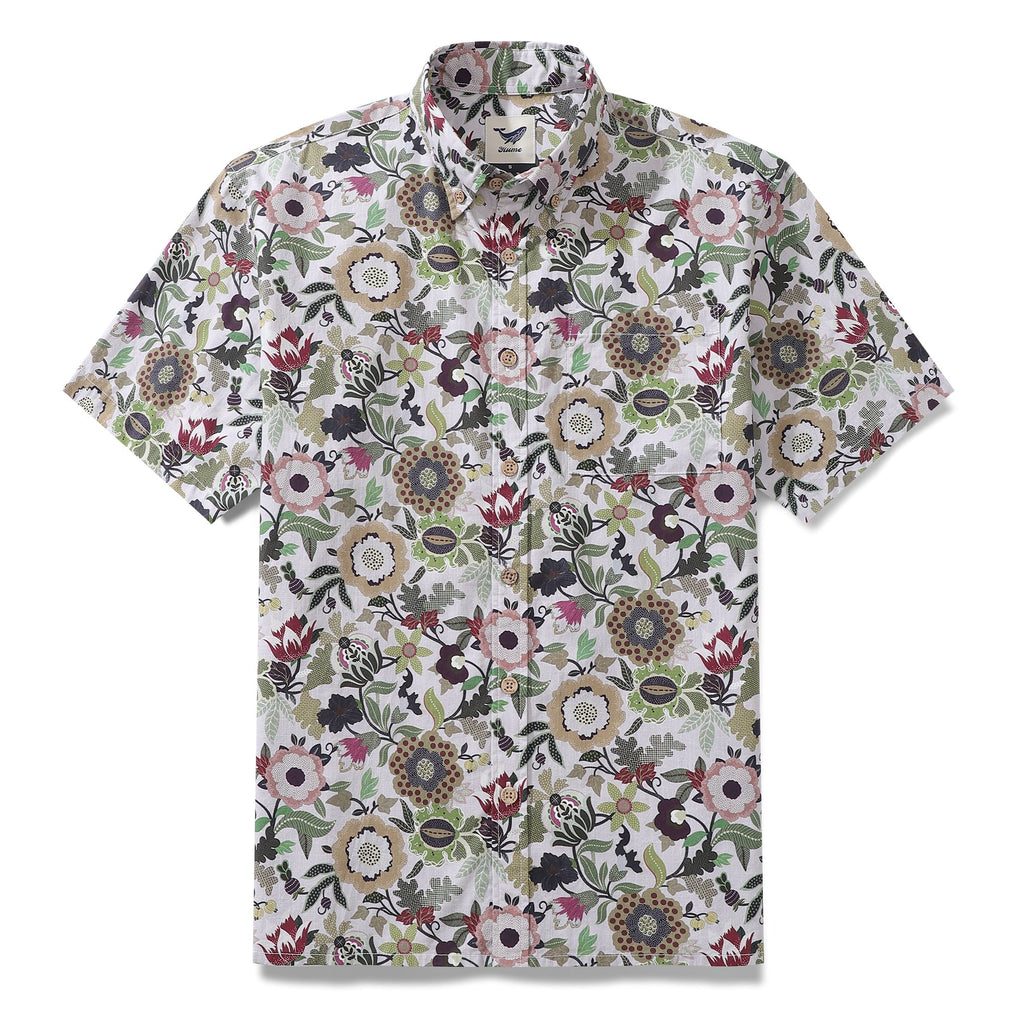 Close up of a men's button-down shirt featuring a detailed Jacobean-inspired floral print in forest-green and burgundy.