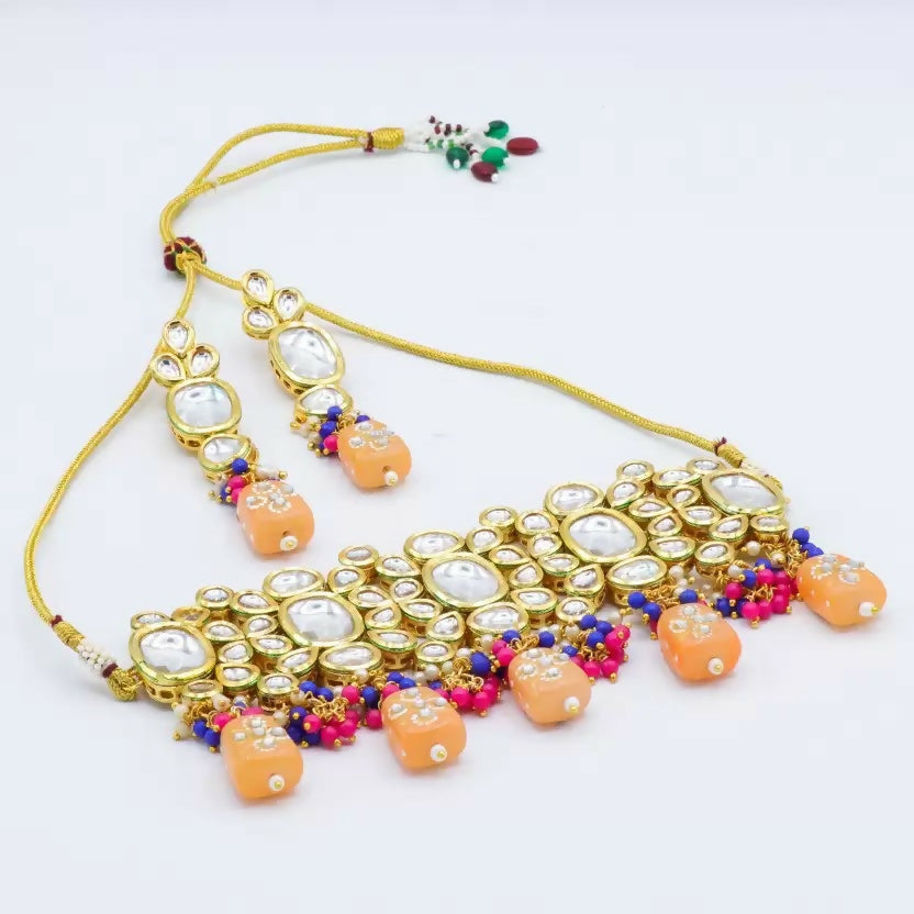 Multicolor Kundan stone necklace with gold plating and adjustable cord tie closure
