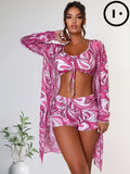 Model wearing a modern two-piece swimsuit with abstract pattern