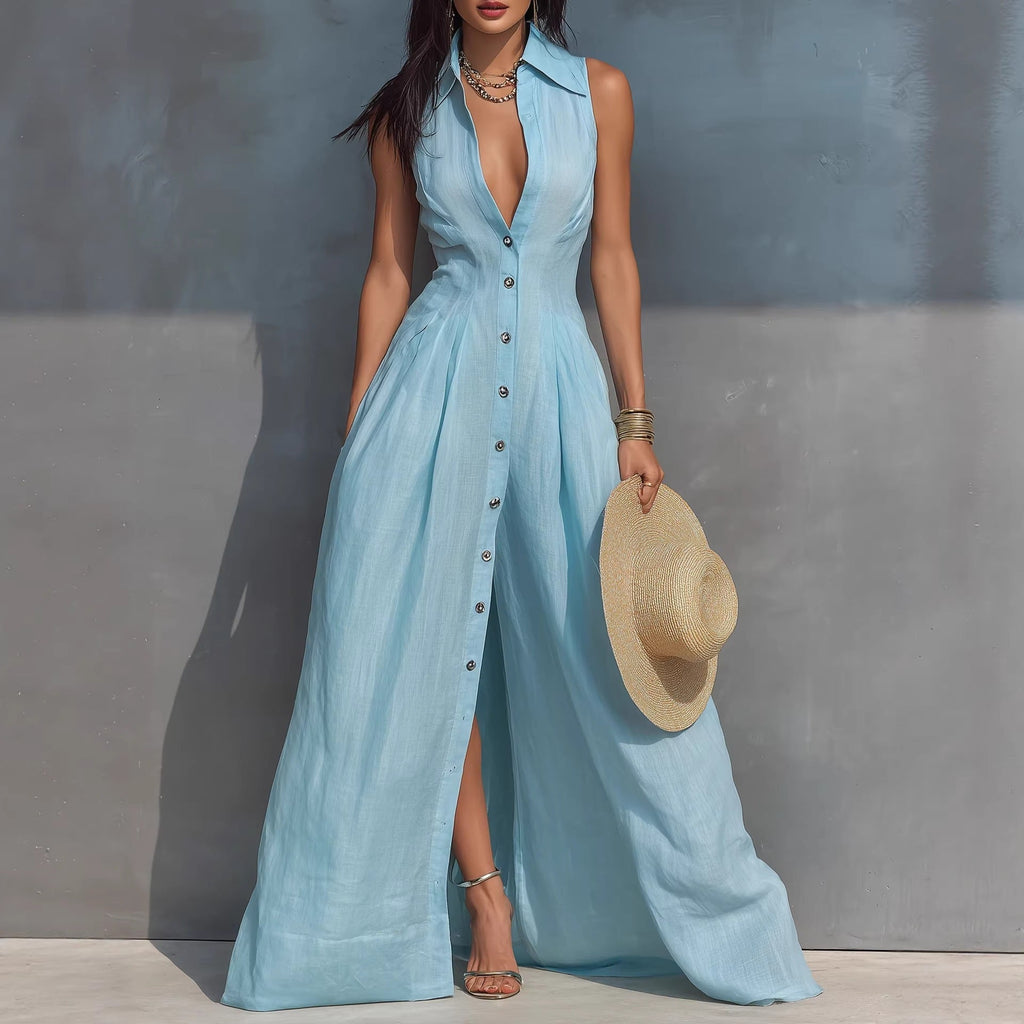 Model wearing a sleeveless light blue button-down maxi dress with a collar, standing in a city street setting.