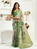 Green linen ready-to-wear saree featuring floral and ethnic motifs with matching unstitched blouse fabric.