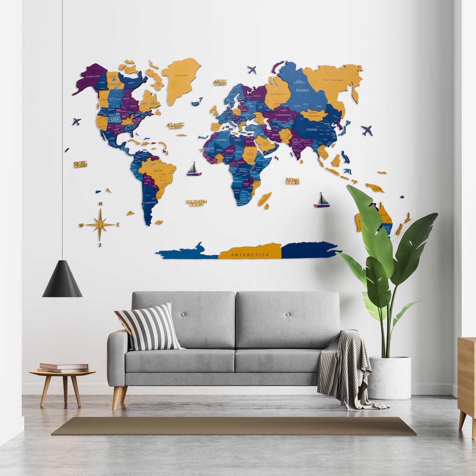 3D multi-colored wooden world map on fiberboard, featuring blue, yellow, and purple accents.