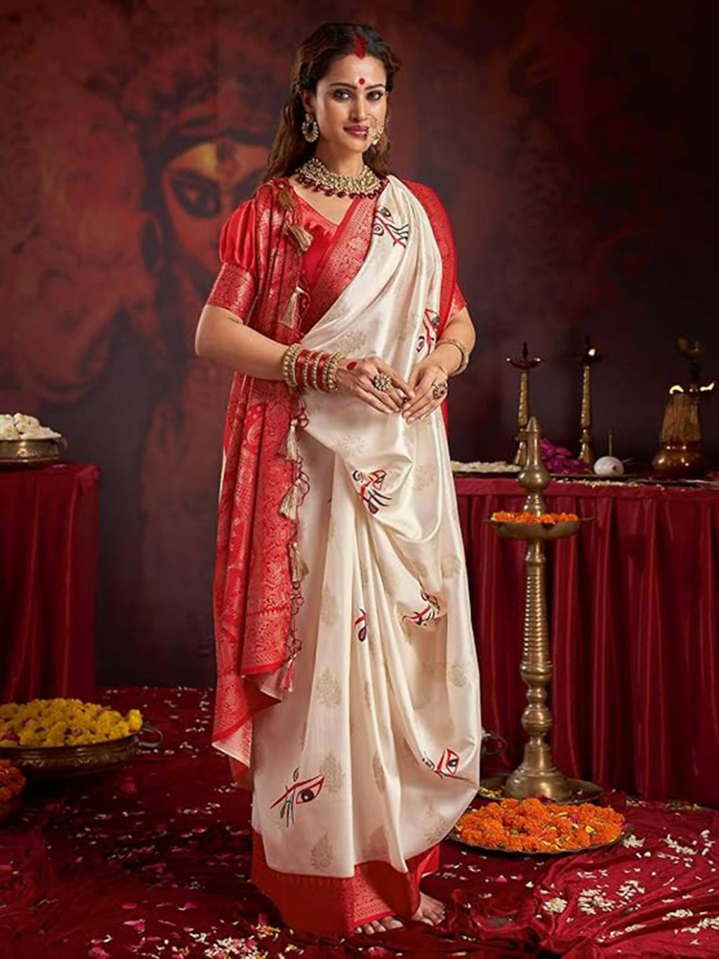Off White satin silk saree with floral print and a contrasting red woven blouse