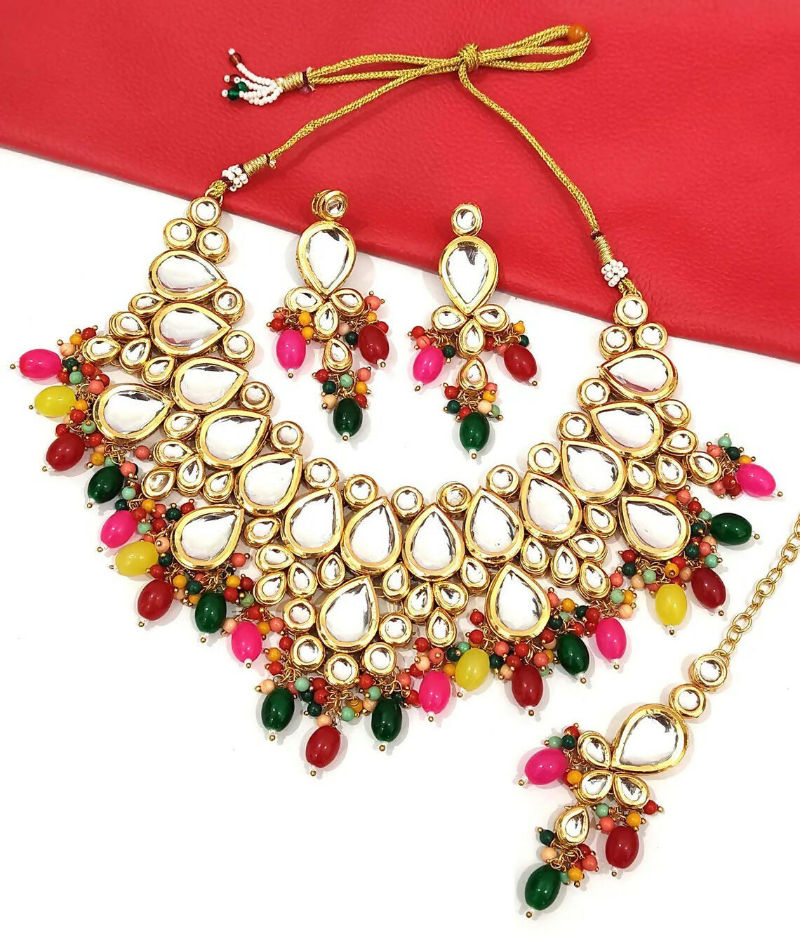 Ornate gold plated Kundan necklace set with stone studs