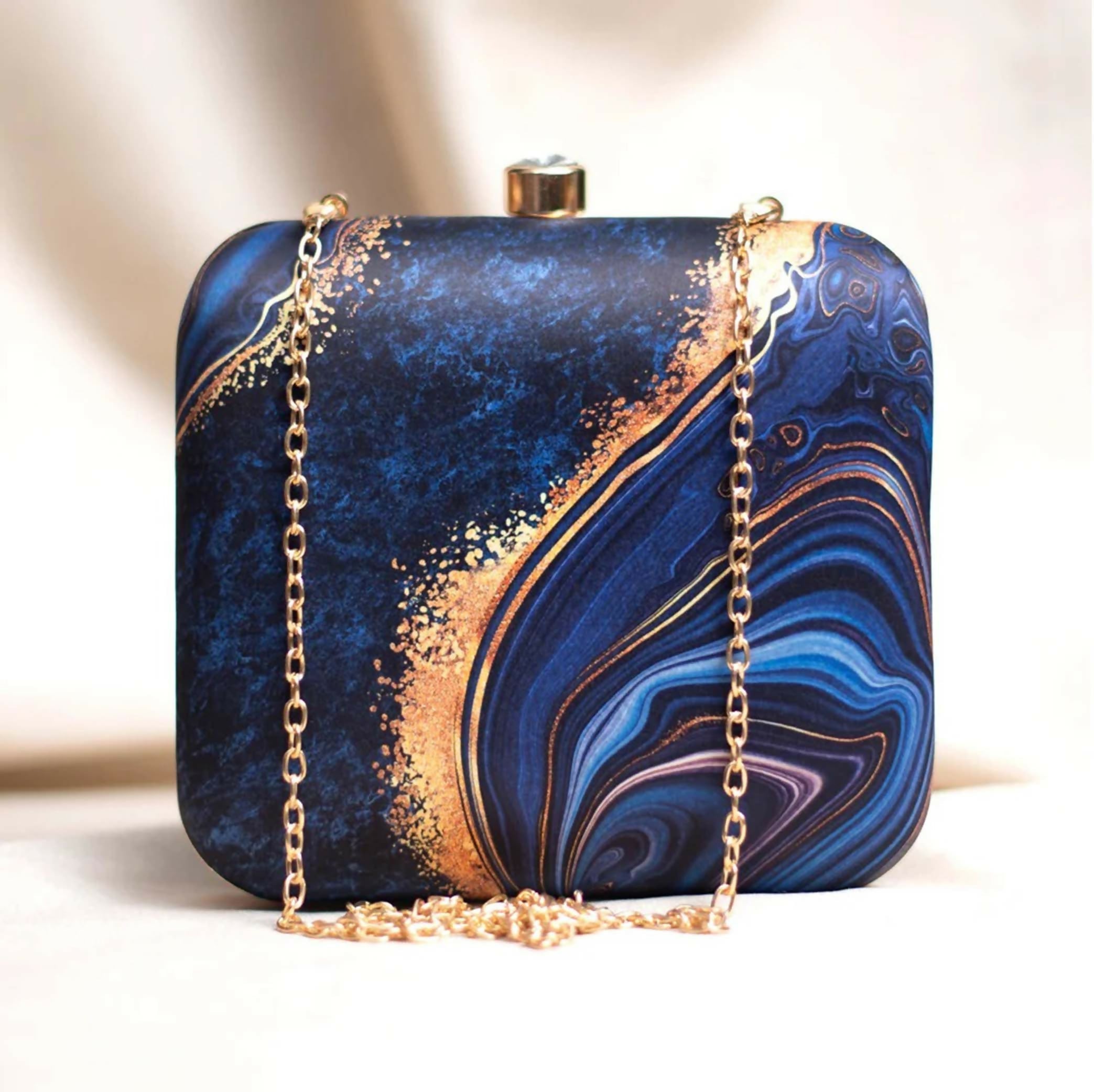 Blue printed hard case MDF clutch for evening wear