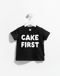 A black and white Cake First kids' graphic cotton t-shirt, perfect for birthday celebrations.