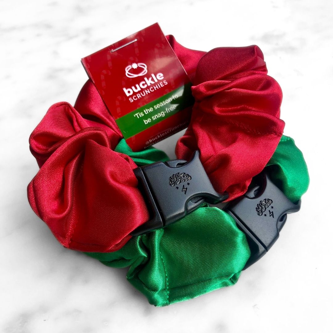 2-pack of holiday-themed satin hair scrunchies in Firecracker Red and Green Apple.