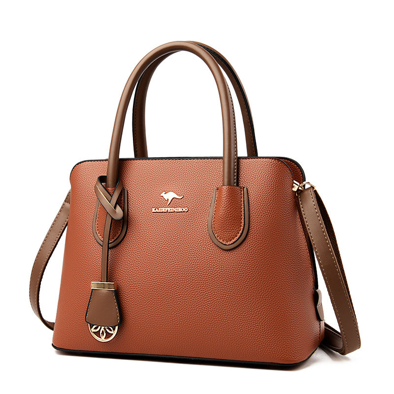 Spacious Leather Diaper Tote Bag with Crossbody Strap for Parents