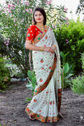 White Dola silk saree with diamond work and heavy jacquard lace border