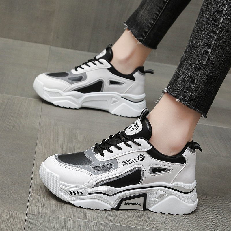 Women’s reflective chunky platform sneakers in black and white streetwear style