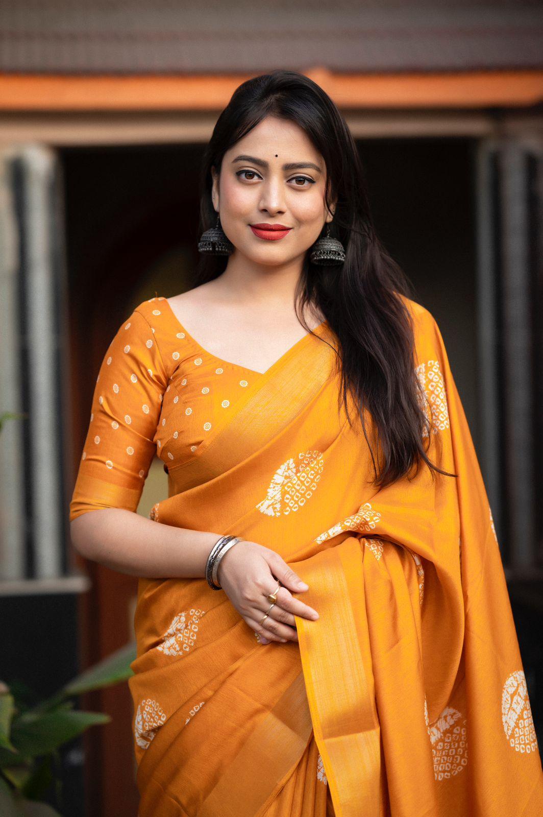 Mustard Cotton Crepe Saree with Batik Print and Zari Border