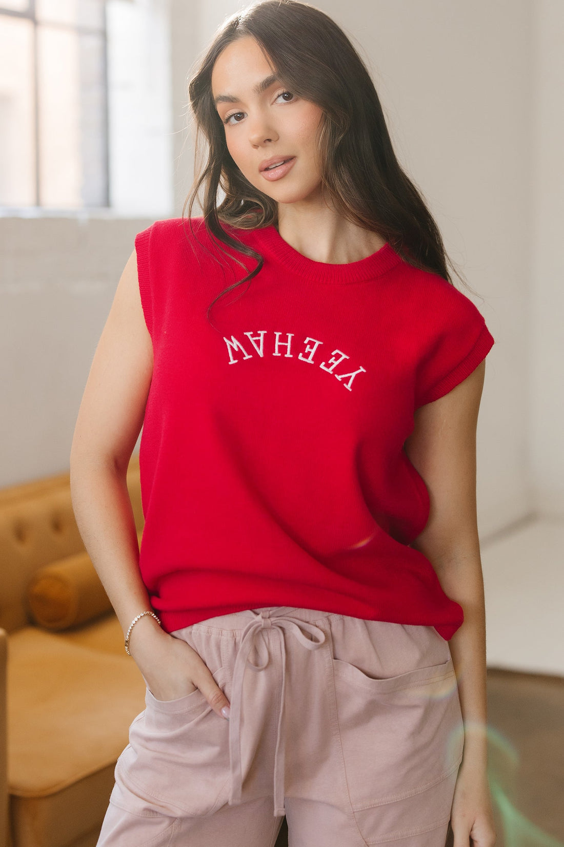 YEEHAW embroidered letter short sleeve knit sweater in red and white.