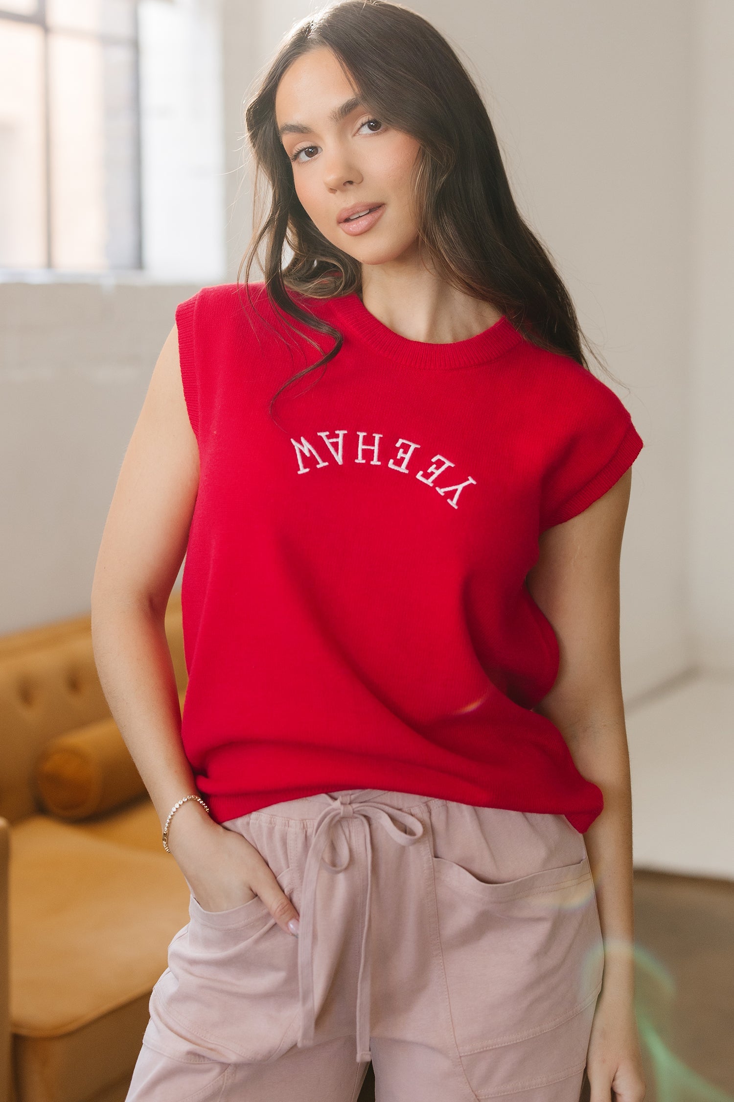 YEEHAW embroidered letter short sleeve knit sweater in red and white.