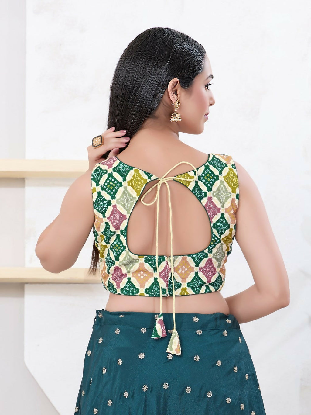 Green Bandhani print sleeveless blouse with boat neck