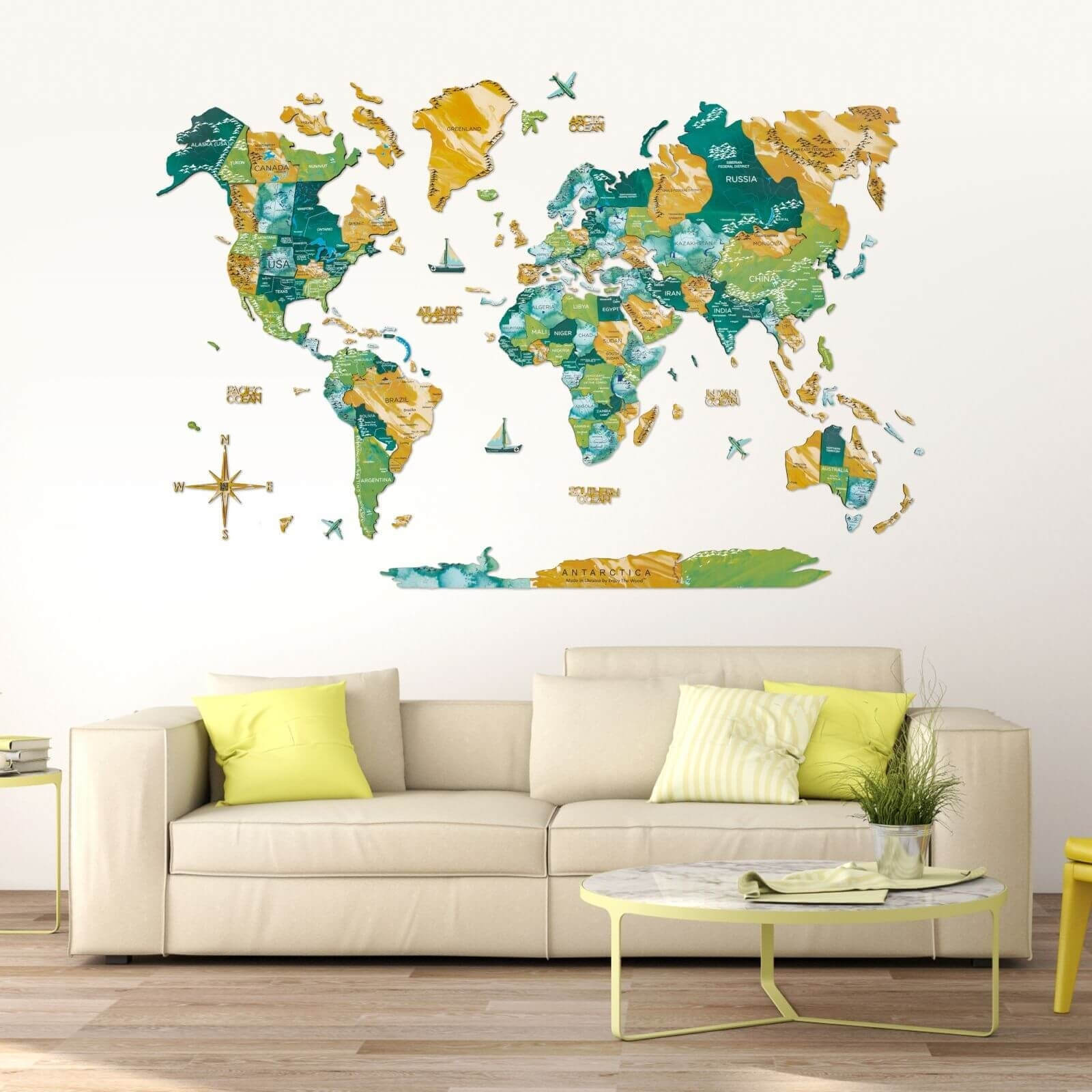 Multi-colored 3D wooden world map mounted on a wall
