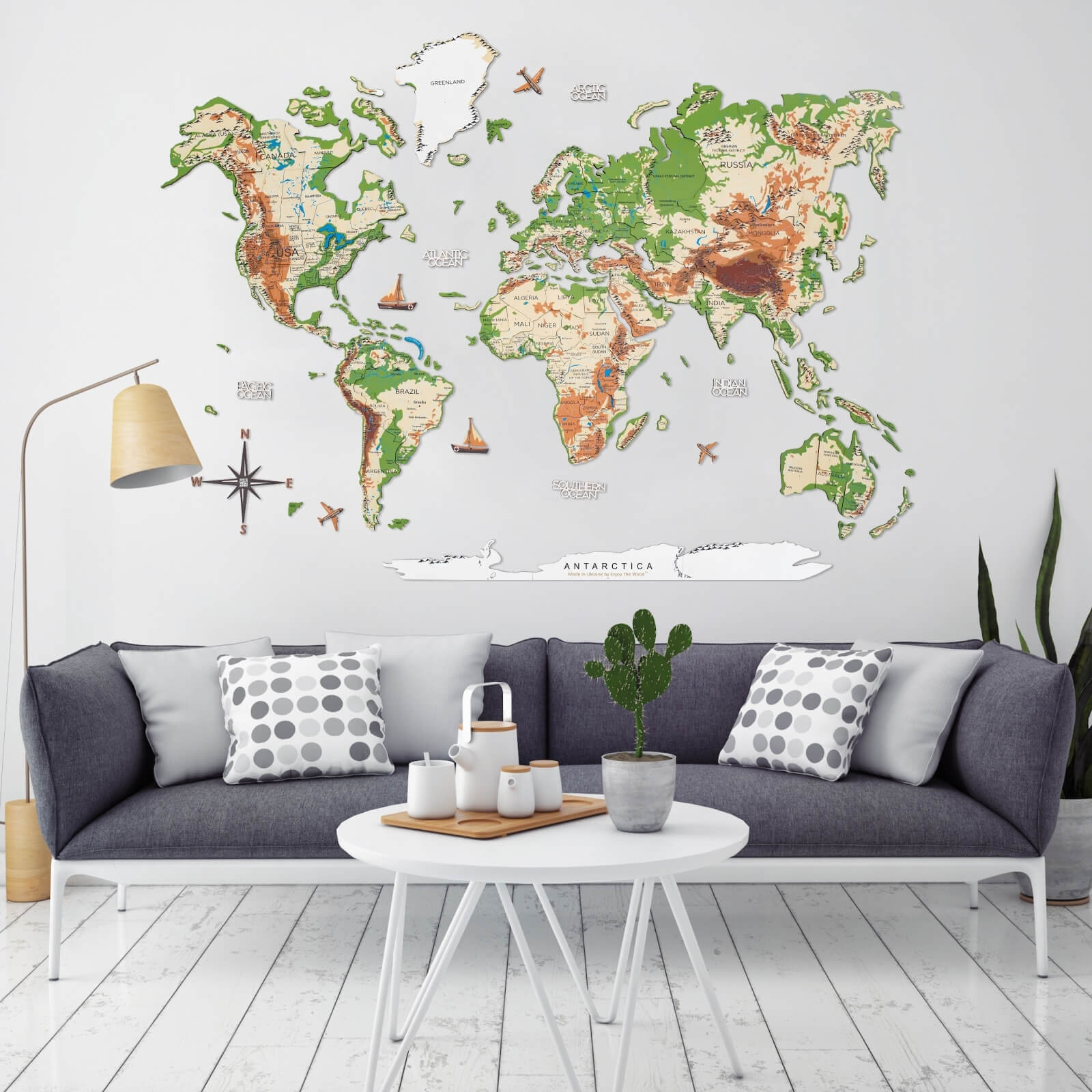 Colorful 3D wooden physical world map displayed on a home accent wall