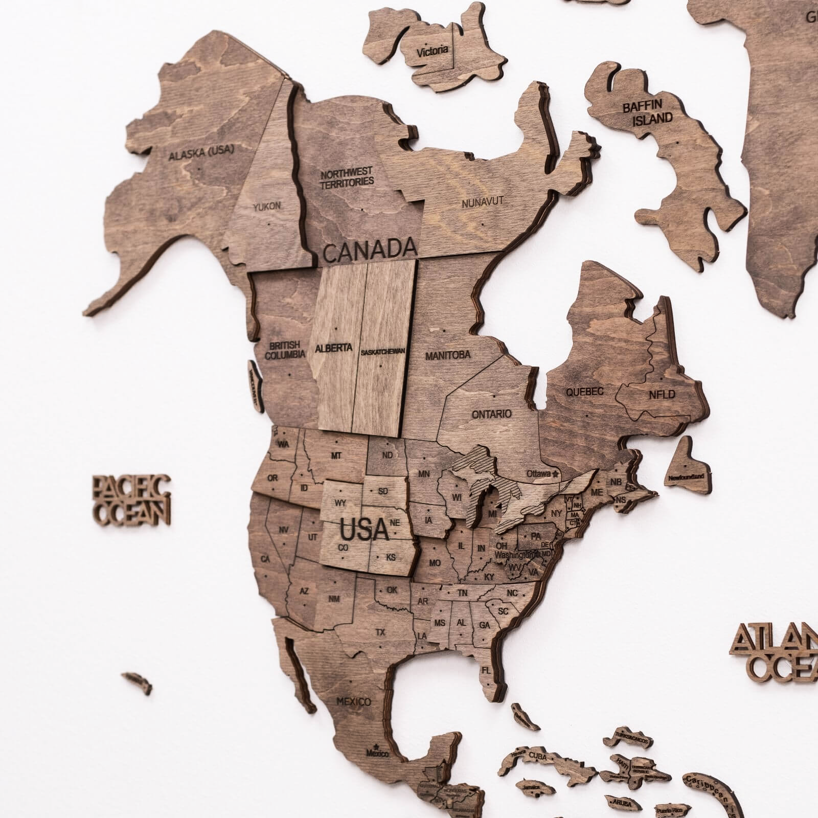 Wooden World Map Wall Decor with Airplane Pins in Brown and Tan