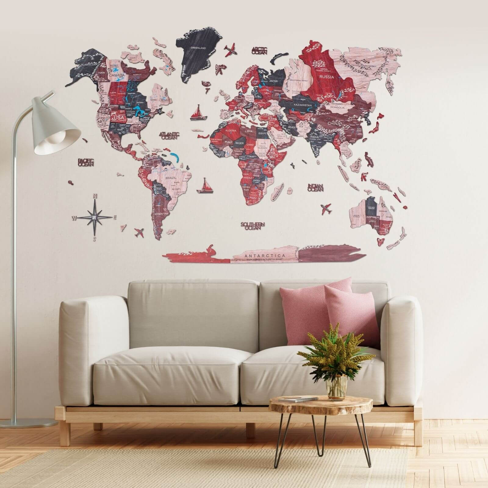 Colorful 3D wooden world map wall art installed on a neutral wall