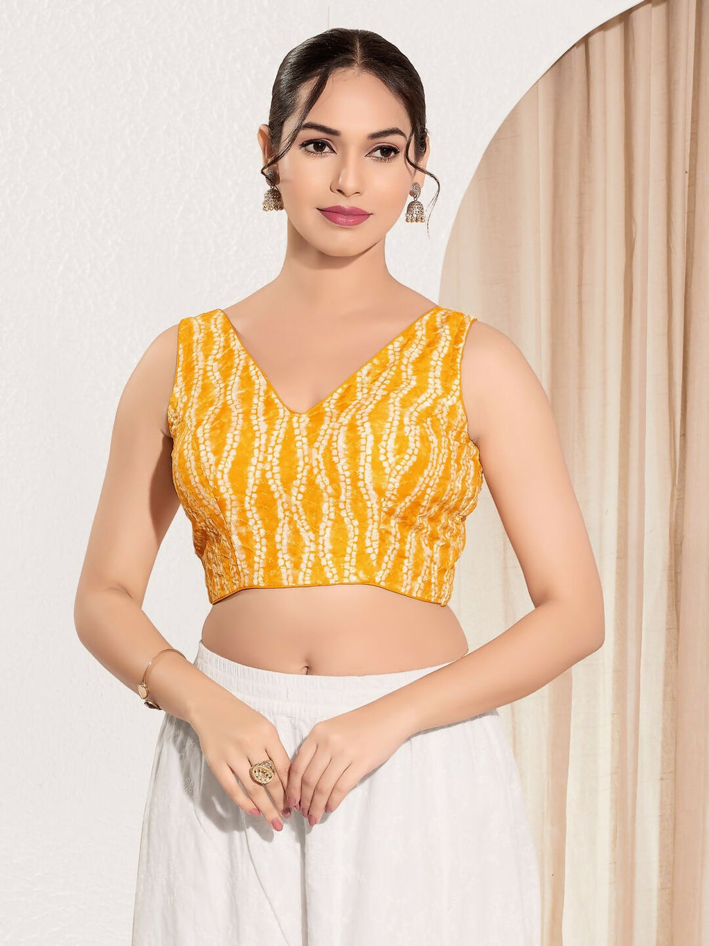 Yellow viscose rayon padded blouse with V-neck, sleeveless