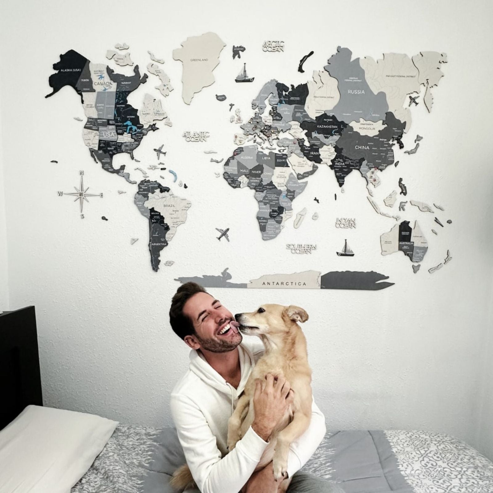 3D Wooden World Map in Nordik grey, white, and black palette mounted on a minimalist wall