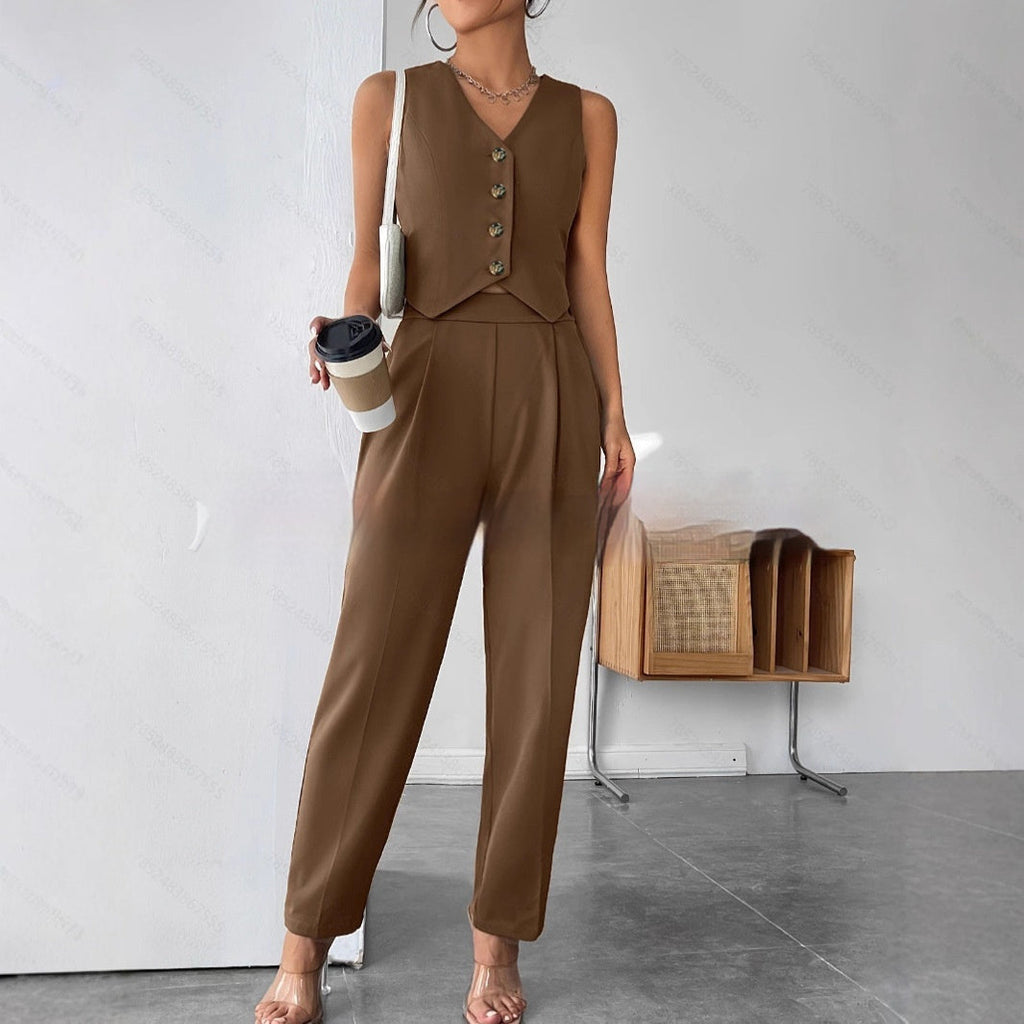Woman wearing a coffee-colored sleeveless vest and matching tailored trousers.