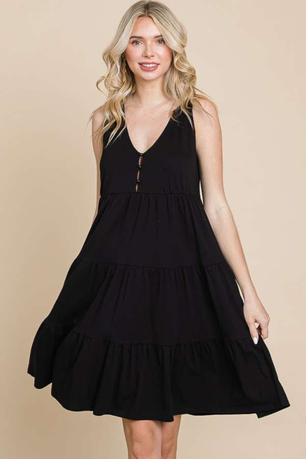 Casual racerback tiered tank dress for women in a summer setting
