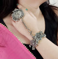 Traditional oxidised silver-plated ethnic bracelet with intricate carvings for festive occasions