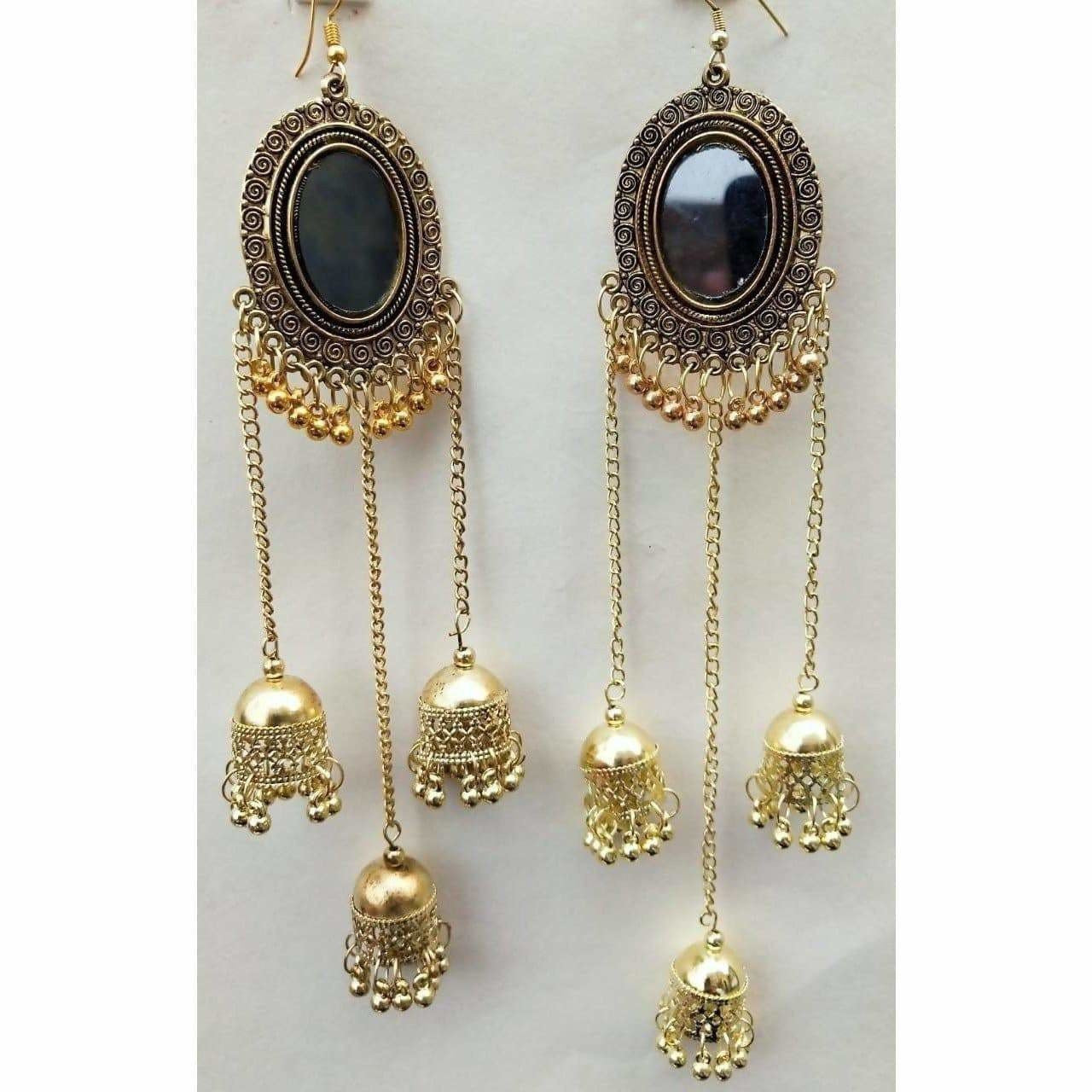 Gold-plated triple-tiered jhumka earrings adorned with classic white pearls.