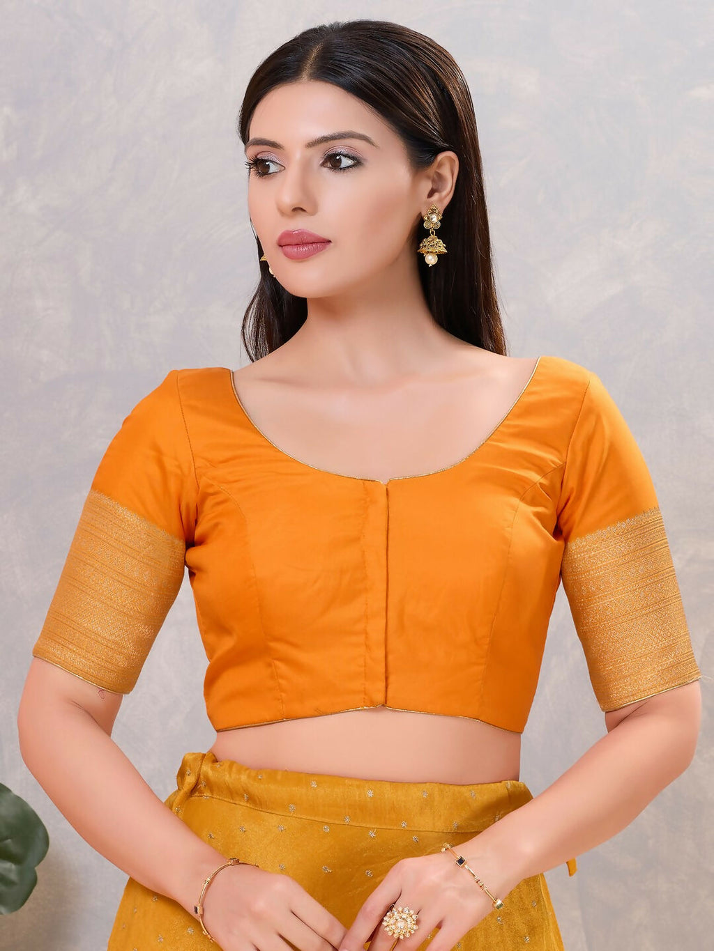 Mustard silk round neck stitched blouse for women
