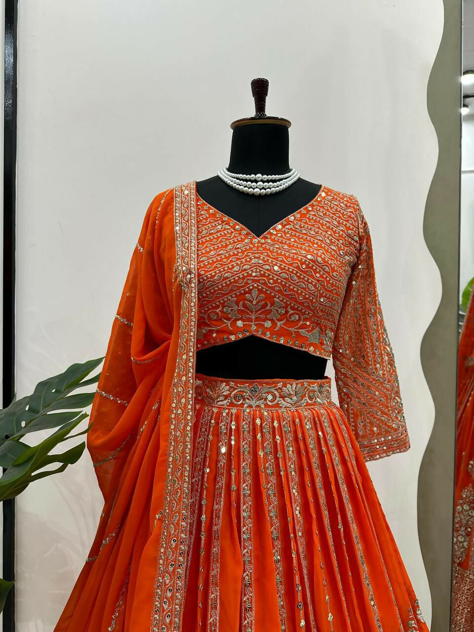 Orange Faux Georgette Lehenga Choli with Sequins and Thread Work