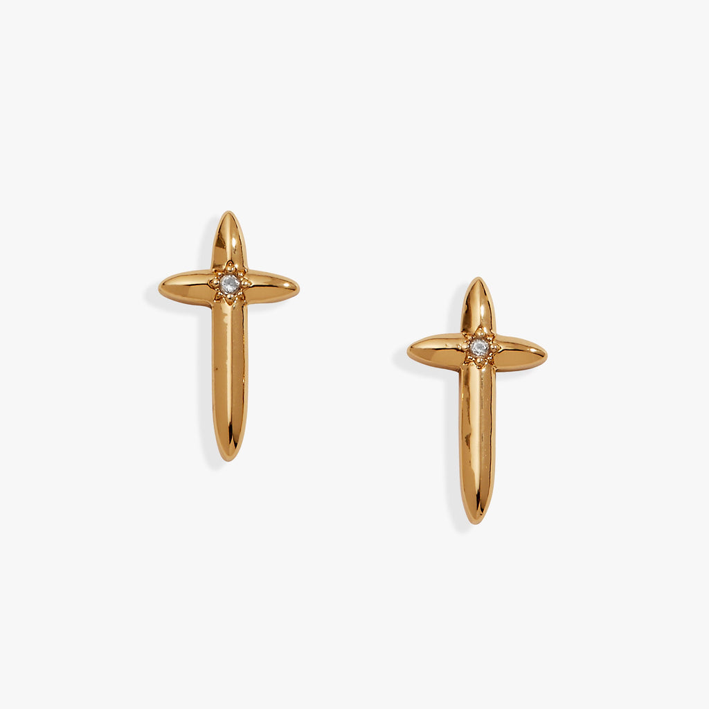 A pair of minimalist, polished gold 4:13 cross stud earrings for women