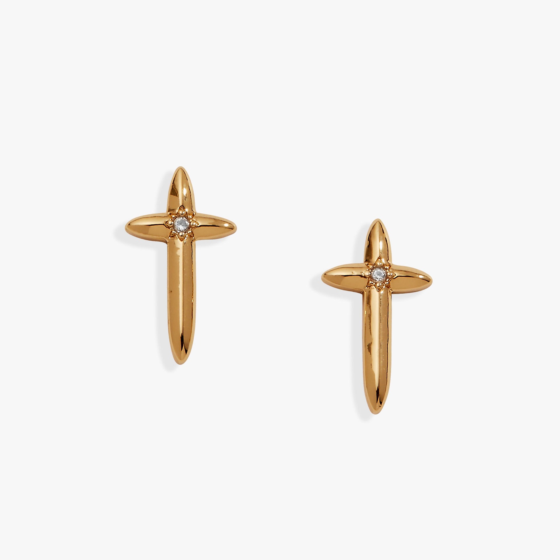 A pair of minimalist, polished gold 4:13 cross stud earrings for women