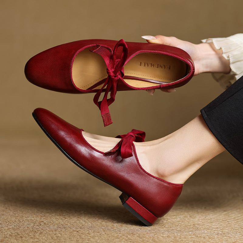 Vintage style genuine leather ballet flats with ribbon bow detailing and low block heel