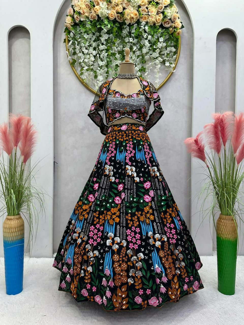 Multicolor floral faux georgette lehenga choli with sequins and thread embroidery.