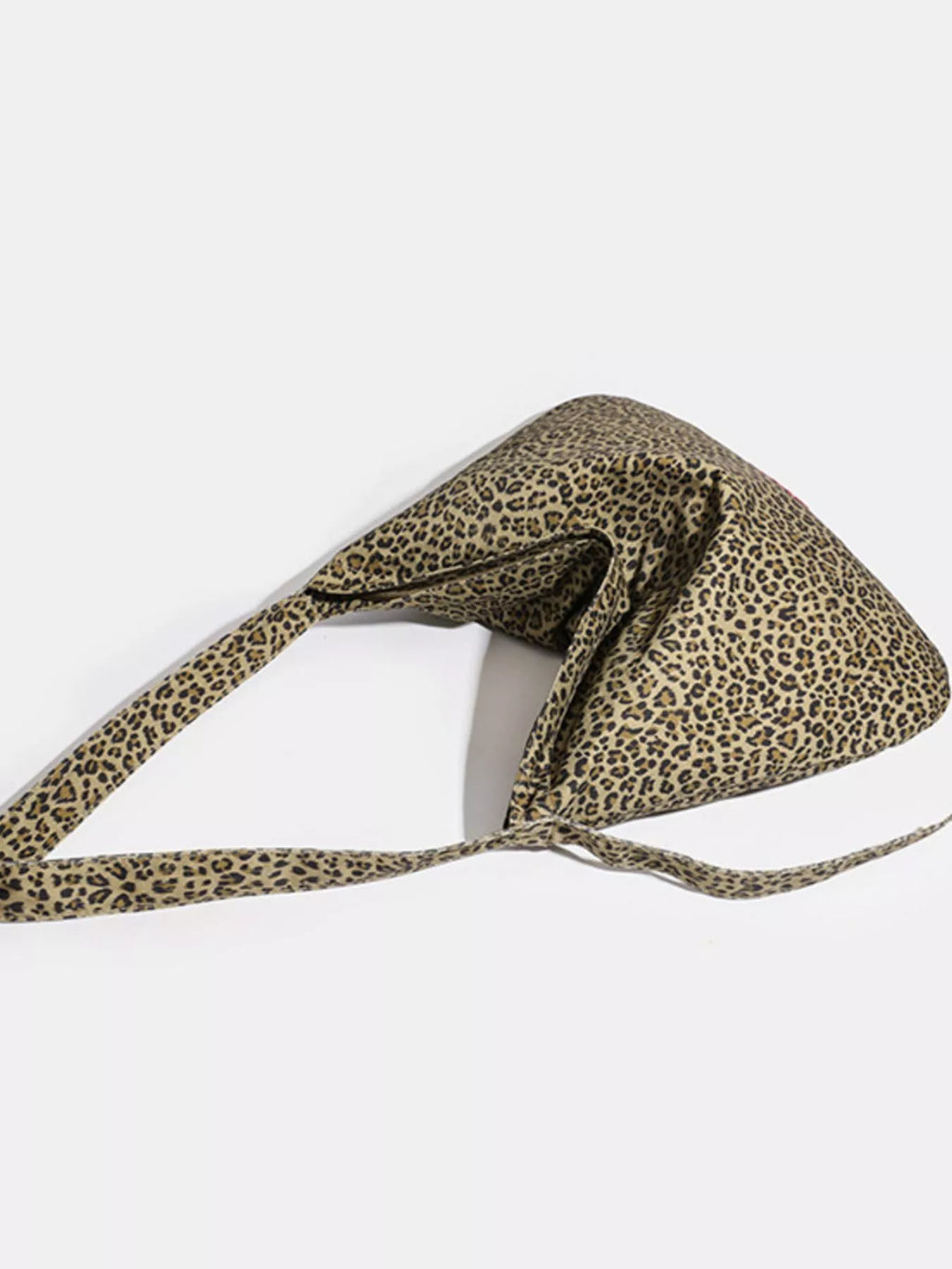 Leopard print headband on a white background